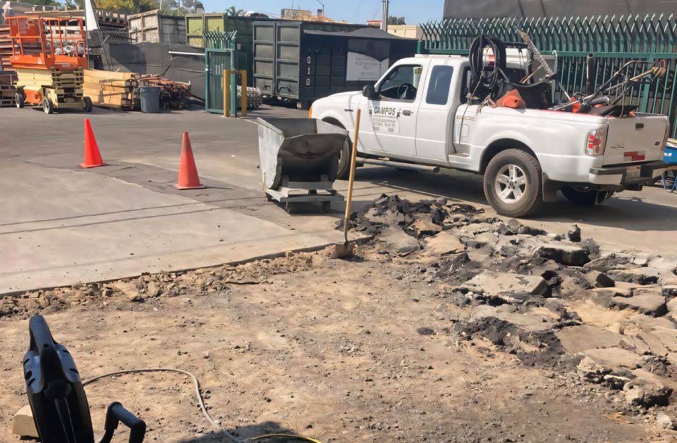 Concrete demolition and removal worksite prepared for replacement